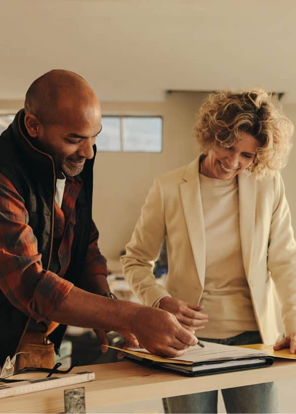 business owners reviewing financial documents