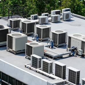 HVAC professionals performing job on roof