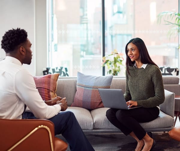 business woman and man talking