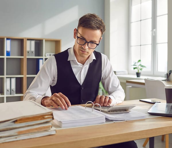 man reviewing company financials